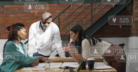 Diverse Colleagues Integrating Social Media Strategy in Office