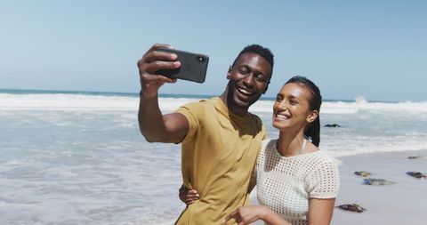 Joyful Couple Taking Selfie at the Beach - Download Free Stock Images Pikwizard.com