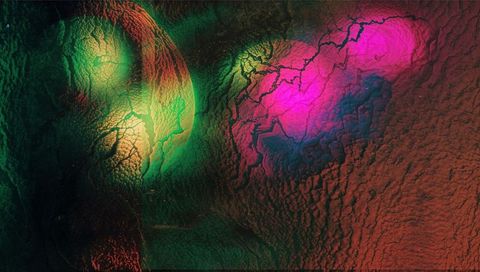 Glowing magenta cracked crust with luminous green orb, abstract planetary texture