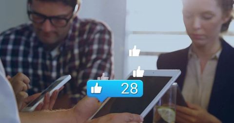 Colleagues Gathering with Digital Devices Sharing Inspiration