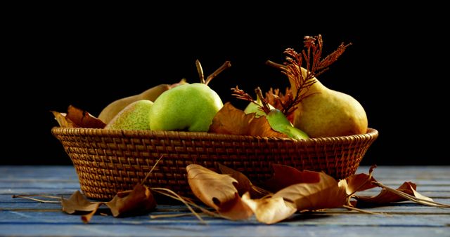 Ripe Pears in Rustic Wicker Basket with Autumn Leaves on Wooden Table - Download Free Stock Images Pikwizard.com