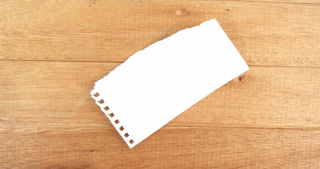 Torn Piece of White Paper on Wooden Surface - Download Free Stock Images Pikwizard.com