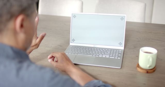 Person Using Laptop with Coffee on Wooden Table for Work or Study - Download Free Stock Images Pikwizard.com