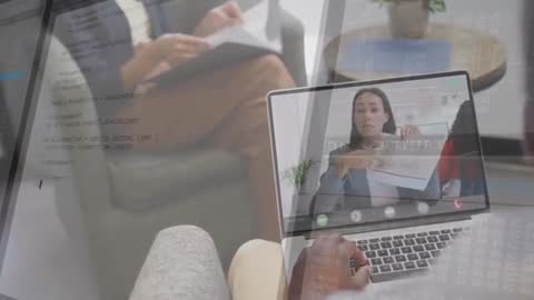Remote Team Meeting with Laptop Screen Overlain with Code