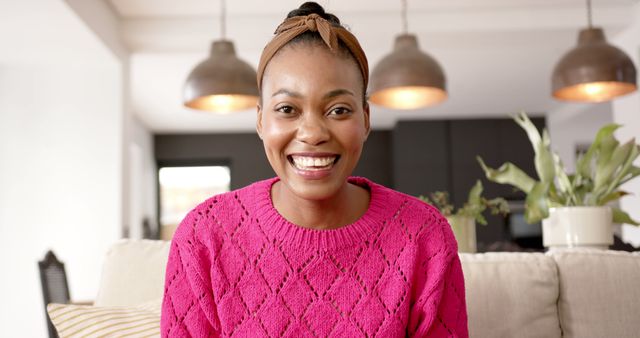 Smiling Woman in Bright Pink Sweater at Home, Happiness and Joy - Download Free Stock Images Pikwizard.com