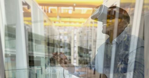 Man Engaged in Virtual Reality Interface over Futuristic Data Center