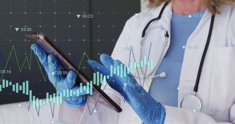 Doctor Analyzing Digital Data on Tablet with Performance Graph Overlay