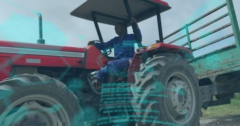 Farmer operating tractor with high-tech overlay on agricultural land