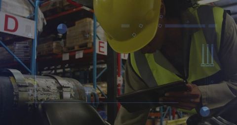 Female Technician Inspecting Industrial Motor with Tablet in Warehouse Aisle