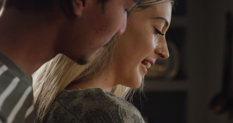 Couple Bonding in Kitchen Preparing Drinks