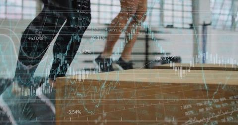 Fitness duo doing plyometric box jumps with market data overlay for performance insights