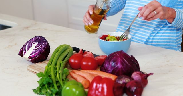 Preparing Healthy Salad with Fresh Vegetables and Olive Oil - Download Free Stock Images Pikwizard.com