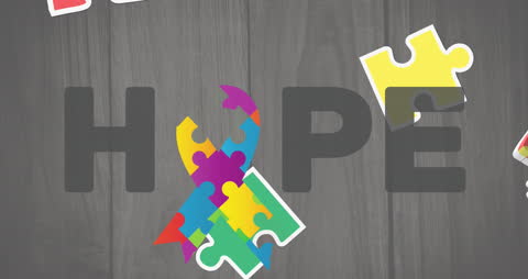 Autism Awareness Concept with Puzzle Ribbon and Hope Text