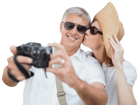 Cheerful middle-aged couple taking vacation selfie transparent