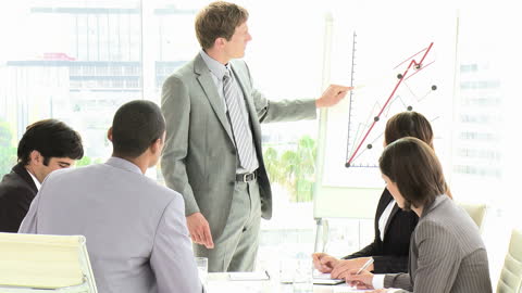 Diverse Business Team Engaged in Meeting Presentation