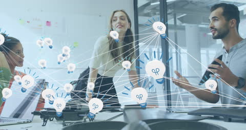 Diverse Team Brainstorming with Innovative Bulb Icons Networking Concept