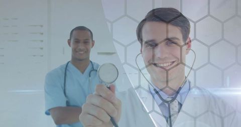 Team of doctors posing confidently with stethoscope