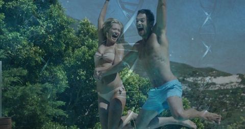 Excited Couple Jumping Into Refreshing Swimming Pool Outdoors