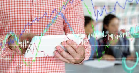 Teacher Using Tablet With Data Analysis Overlay in School Classroom