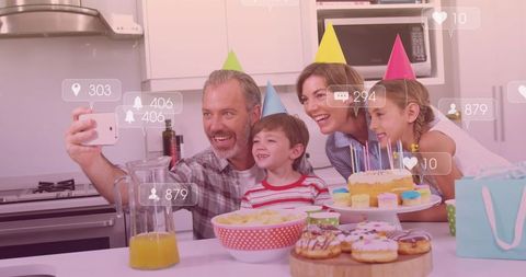 Happy Family Celebrating Birthday with Social Media Engagement