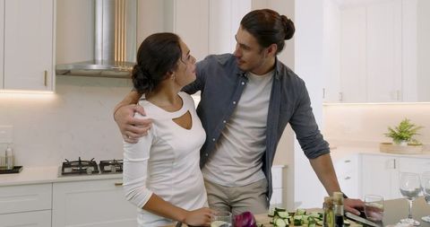 Couple Preparing Healthy Meal in Modern Kitchen