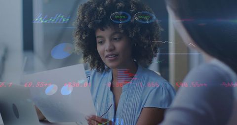 Diverse Businesswomen Discussing Data Analytics for Corporate Strategy