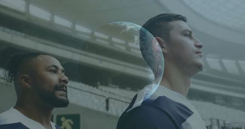 Athletes in arena with futuristic hologram overlay