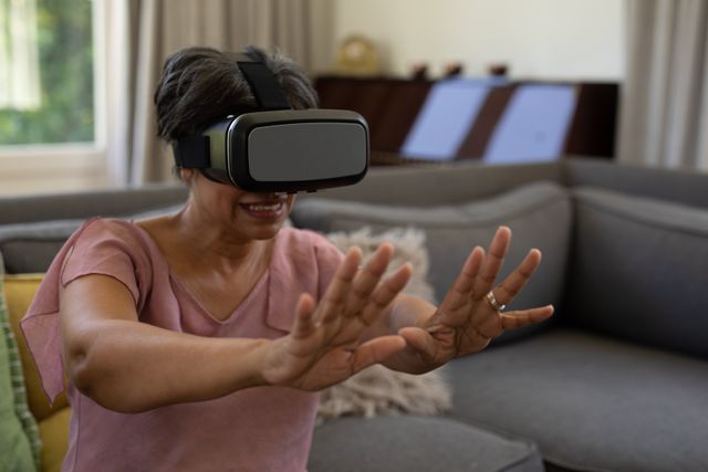 Senior Woman Enjoying Virtual Reality at Home - Download Free Stock Images Pikwizard.com