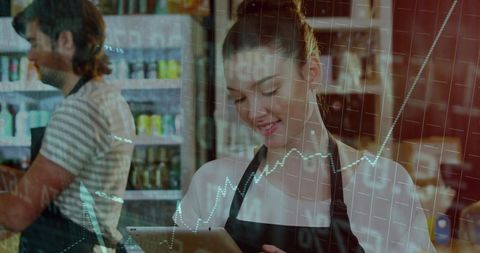 Cafe Staff Analyzing Productivity on Tablet