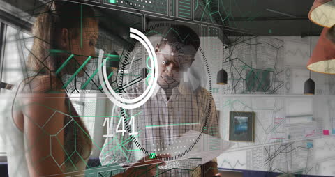 Digital Business Team Analyzing Futuristic Graphs