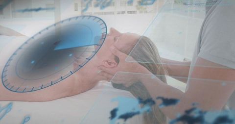 Mature woman receiving chiropractic neck adjustment with blue hud overlay medical tech