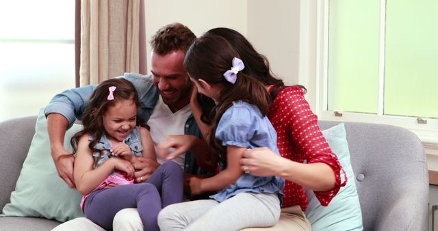 Happy Family Playing on Couch at Home - Download Free Stock Images Pikwizard.com