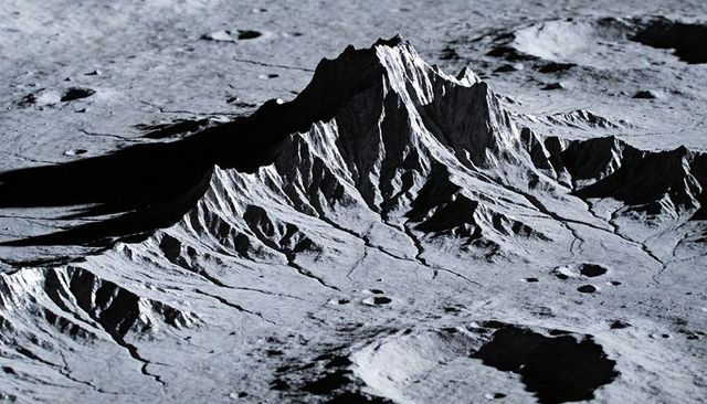 Dramatic craggy lunar peak casting long shadows across dusty regolith plain