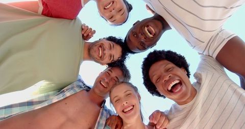 Diverse Friends Enjoying Outdoors in Joyful Huddle - Download Free Stock Images Pikwizard.com