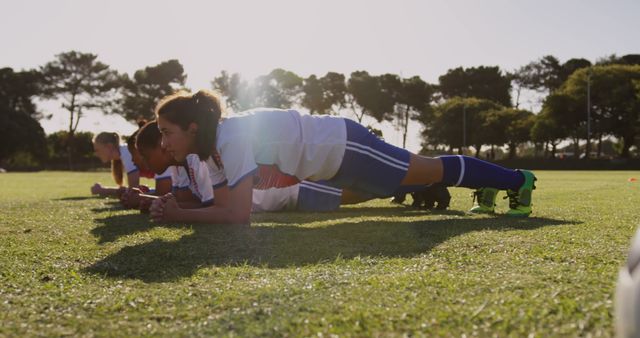 Youth Soccer Players Doing Plank Exercise Outdoor Field - Download Free Stock Images Pikwizard.com