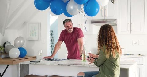 Joyful Home Celebration with Drinks and Conversations