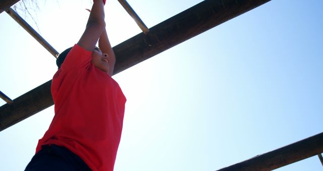 Child Enjoying Outdoor Monkey Bars on Sunny Day - Download Free Stock Images Pikwizard.com