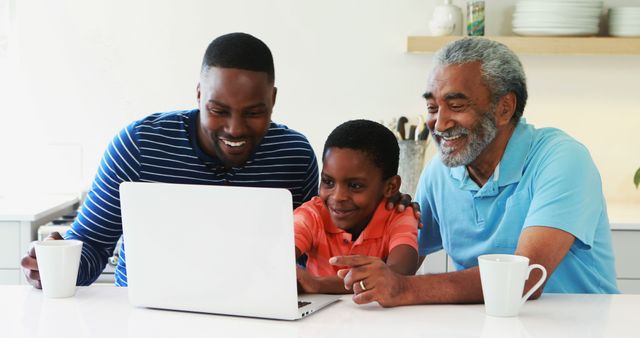 Multi-Generational Family Bonding Over Laptop at Home - Download Free Stock Images Pikwizard.com