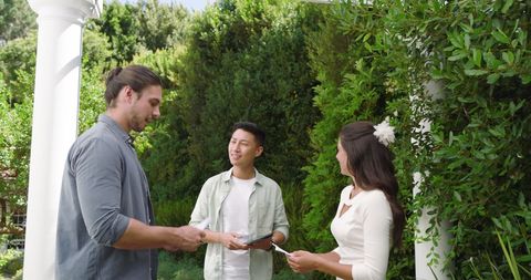 Friends Conversing at Romantic Outdoor Garden Celebration