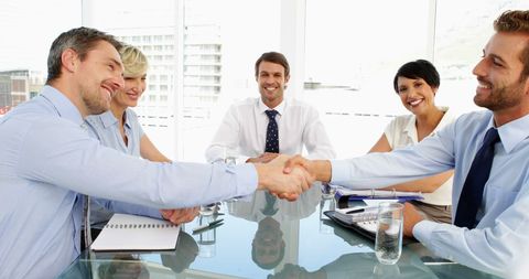 Confident Business Meeting with Successful Handshake Collaboration - Download Free Stock Images Pikwizard.com