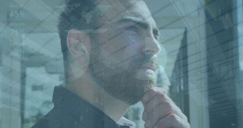 Thoughtful Businessman Analyzing Digital Data Trends