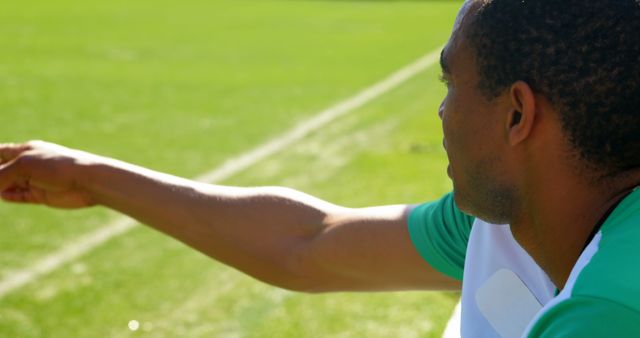 Soccer Player on Bench Gesturing Towards Field - Download Free Stock Images Pikwizard.com