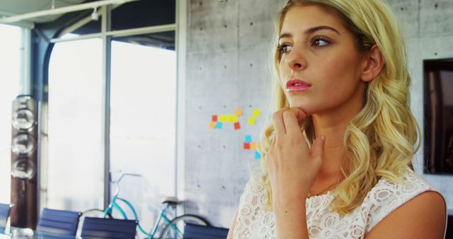 Thoughtful Blonde Businesswoman Thinking in Modern Office - Download Free Stock Images Pikwizard.com