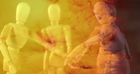 Wooden Mannequins Shaking Hands in Abstract Orange Cloud Scene