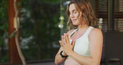 Serene Pregnant Woman Practicing Yoga Mindfulness Outdoors