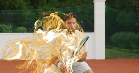 Dynamic action athlete swinging racket with golden motion effect