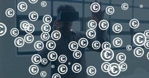 Man Interacting with Virtual Euro Symbols Using VR Headset - Download Free Stock Images Pikwizard.com