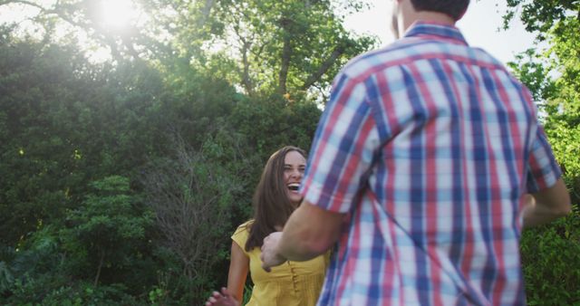 Joyful Couple Dancing Together Outdoors in Sunny Park - Download Free Stock Images Pikwizard.com