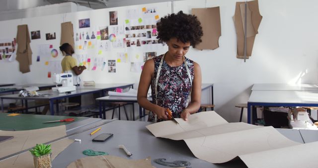 Fashion Design Student Cutting Patterns in Classroom - Download Free Stock Images Pikwizard.com