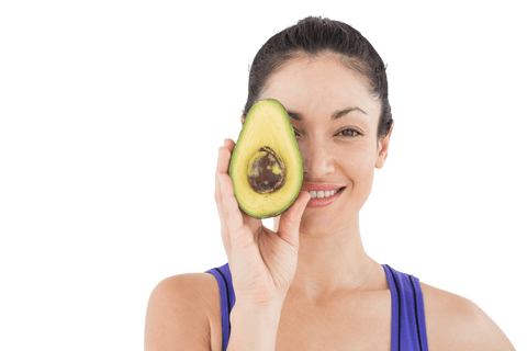 smiling woman holding split avocado against transparent background - Download Free Stock Videos Pikwizard.com